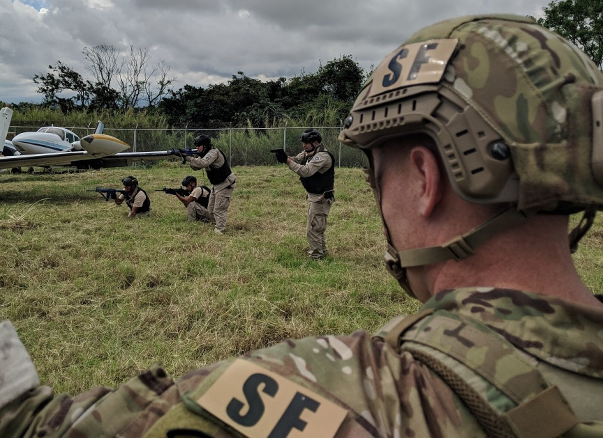 Tech. Sgt. Benjamin Wilson, 571st Mobility Support Advisory Squadron air advisor, assesses students in an air interdiction scenario, during a three-week building partnership capacity mission with the Costa Rican air vigilance service, May 16 through June 9, 2018. The mobility training team's mission was to train and advise the SVA in aircraft interdiction, aircraft maintenance, base defense and dog handling as they continue to counter illicit drug trafficking throughout the region. (U.S. Air Force photo by Capt. LaDarian Outsey)