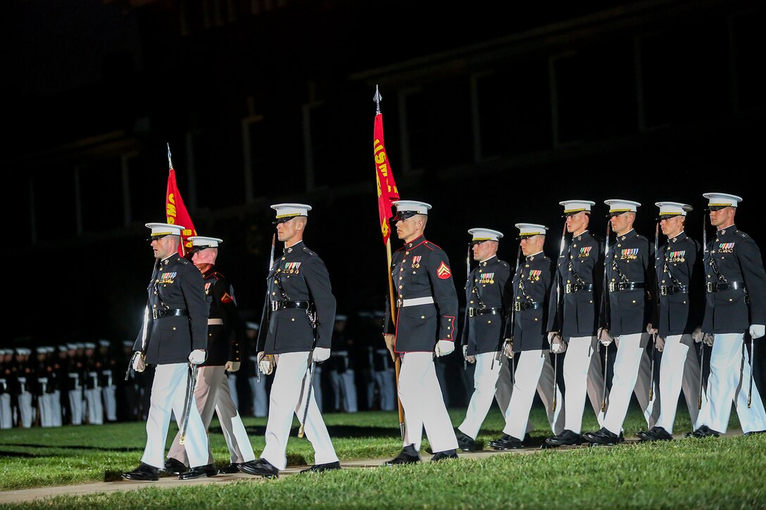 Marines with Marine Barracks Washington D.C. march down Center Walk during a Friday Evening Parade at the Barracks, June 15, 2018.