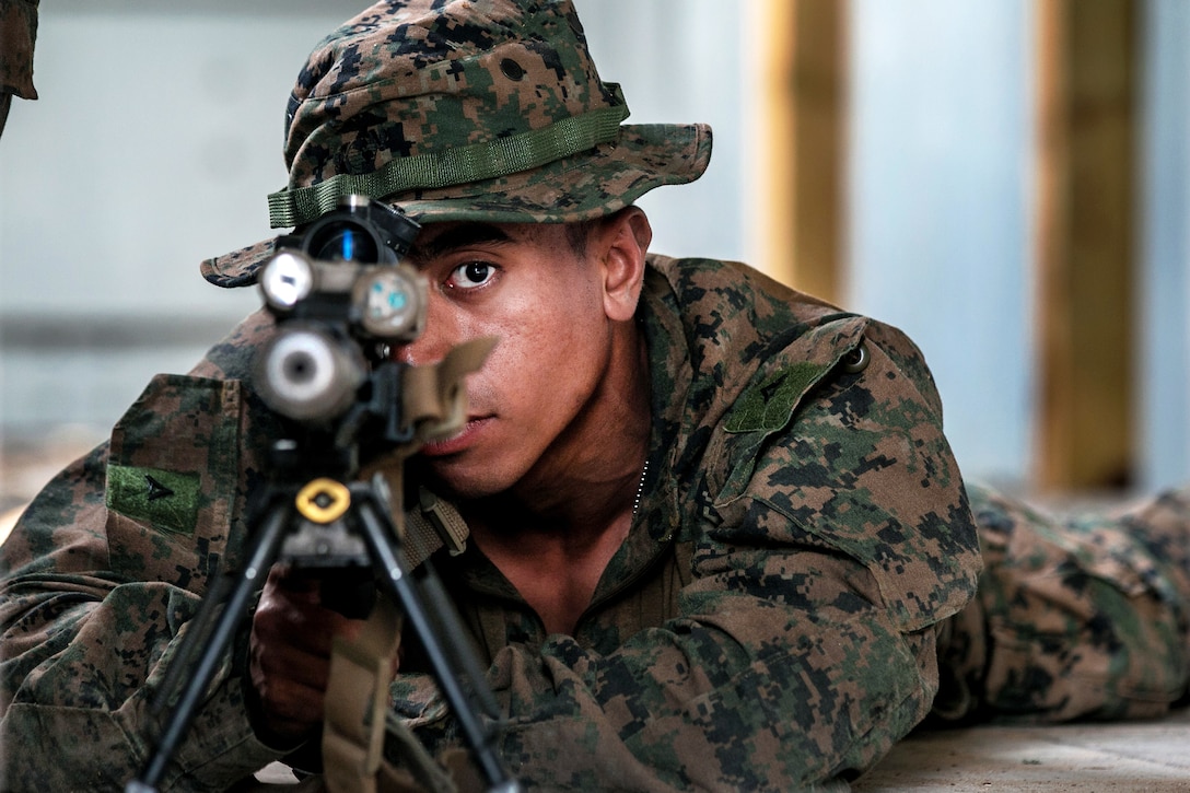 A U.S. Marine role-plays as an opposing force during a training exercise.