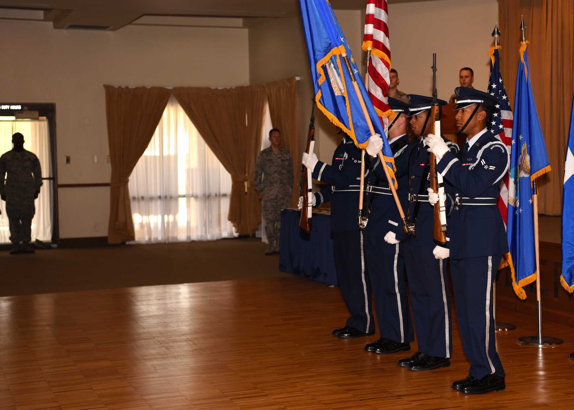 Luke’s Honor Guard presents the colors at an achievement medal ceremony June 13, 2018 at Luke Air Force Base, Ariz. The honor guard is comprised of volunteer Airmen from units across the base. (U.S. Air Force photo by Airmen 1st Class Aspen Reid)