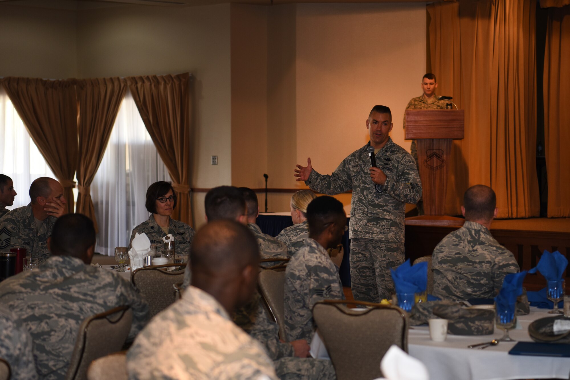 Brig. Gen. Brook Leonard, 56th Fighter Wing Commander, gives remarks after presenting Luke’s graduating honor guardsmen with an Air Force Achievement medal June 13, 2018 at Luke Air Force Base, Ariz. The ceremony was the culmination of the honor guardsmen’s one-year service to Luke’s Honor Guard program. (U.S. Air Force photo by Airmen 1st Class Aspen Reid)