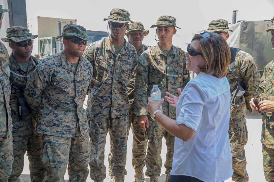 Ms. Juliet Beyler, the deputy assistant secretary of the Navy for Military Manpower and Personnel, speaks to Marines of Combat Logistic Battalion 25, 4th Marine Logistics Group, about the importance of their role and how training is being conducted during Integrated Training Exercise 4-18 at Marine Corps Air Ground Combat Center Twentynine Palms, Calif., June 13, 2018.