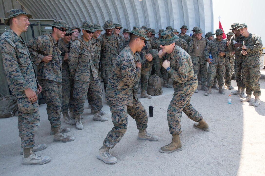 Sgt. Maj. Michael Miller, sergeant major of 4th Marine Division, builds comradery amongst the Marines of Combat Logistics Battalion 25, Combat Logistics Regiment 45, 4th Marine Logistics Group, during Integrated Training Exercise 4-18 at Marine Corps Air Ground Combat Center Twentynine Palms, Calif., June 13, 2018.