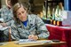 Col. Jennifer Short, 23d Wing (WG) commander, writes down notes during a Spark Tank presentation, June 15, 2018, at Moody Air Force Base, Ga. Spark Tank, a spinoff of the show Shark Tank, gave Airmen the opportunity to propose projects and improvements for Moody to leaders from the 23d WG and the local community. (U.S. Air Force photo by Airman 1st Class Eugene Oliver)