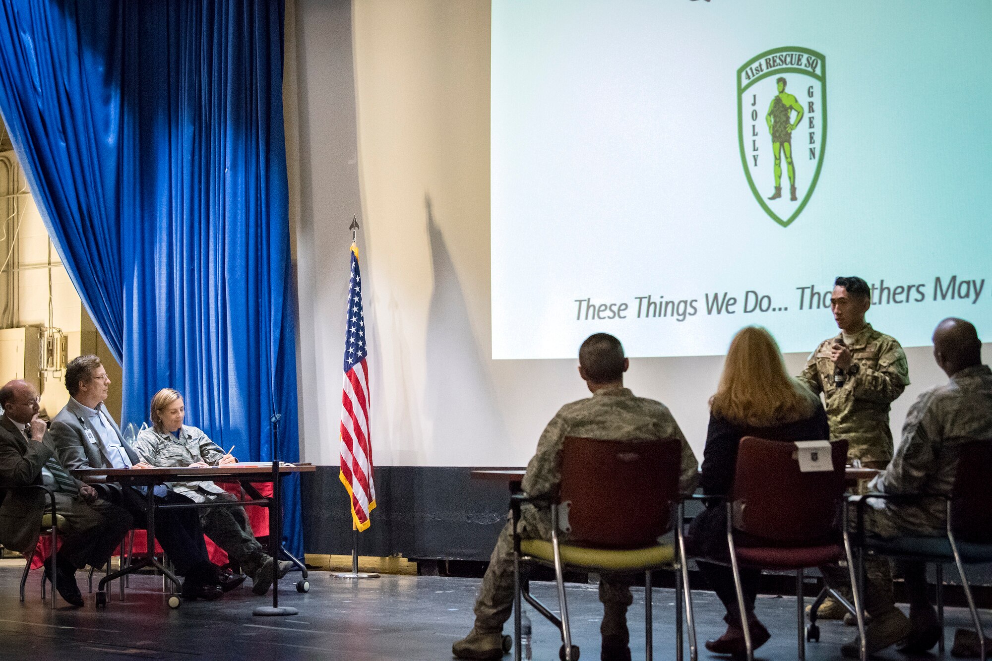 Leadership from the 23d Wing (WG) and local community listen to a presentation from 1st Lt. Art Lomibao, 41st Rescue Squadron resource advisor, during Spark Tank, June 15, 2018, at Moody Air Force Base, Ga.Spark Tank, a spinoff of the show Shark Tank, gave Airmen the opportunity to propose projects and improvements for Moody to leaders from the 23d WG and the local community. (U.S. Air Force photo by Airman 1st Class Eugene Oliver)