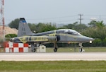 T-38C Talon Instructor Pilot (front), Lt. Col Edward Stapanon III, and Combat Systems Officer (rear), Maj. Brion Nielsen, begin their take-off roll for a training mission April 18, 2018, at Joint Base San Antonio-Randolph, Texas. The aircraft recently completed the Pacer Classic III modification package and still shows its distinctive tiger stripes that will be removed when the aircraft receives its next scheduled complete paint job. (U.S. Air Force photo by Alex R. Lloyd)