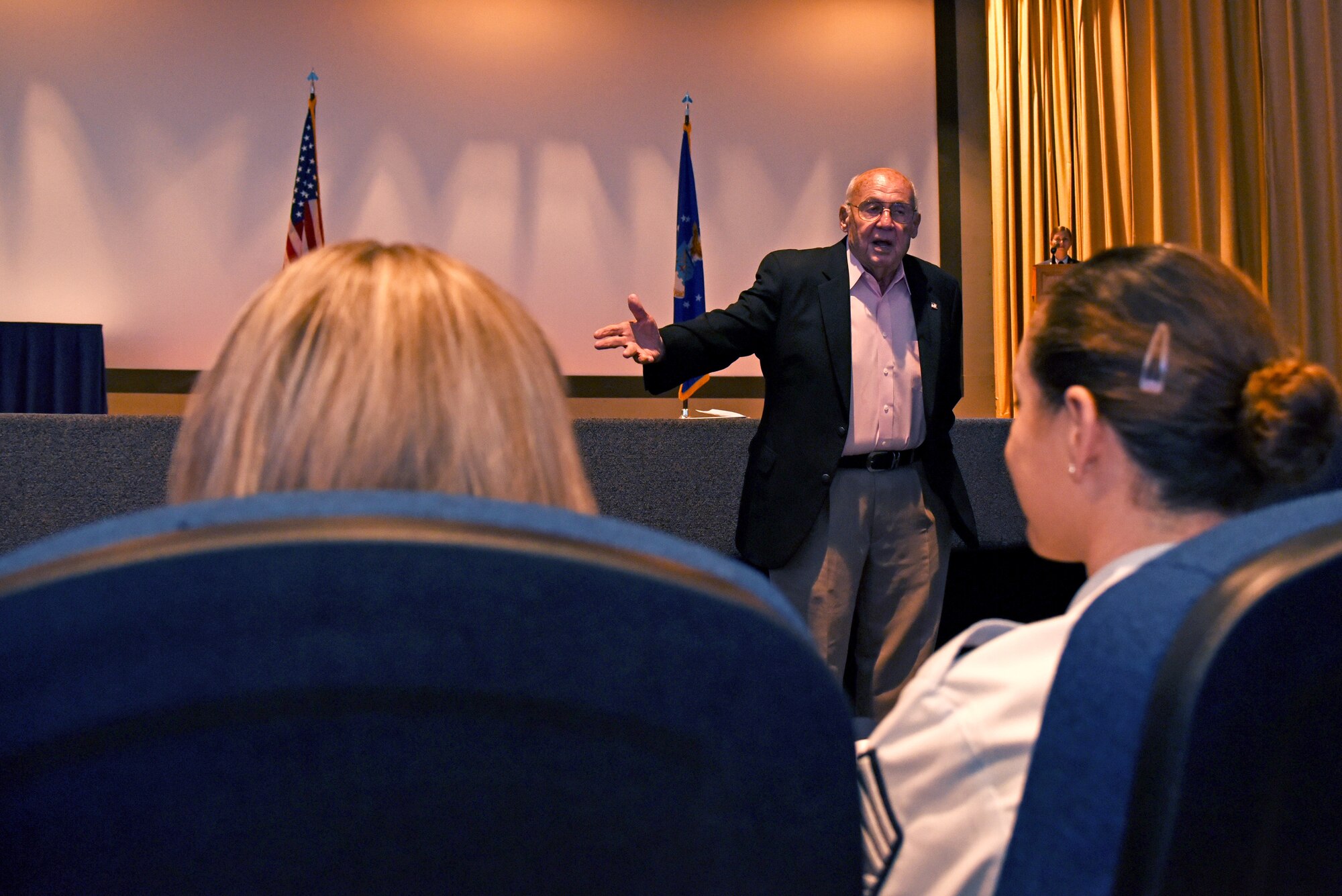 Retired U.S. Air Force Col. Charles Powell, former 17th Training Wing commander, speaks during a Community College of the Air Force graduate ceremony at the base theater on Goodfellow Air Force Base, Texas, June 15, 2018. Every year Powell presents the Powell Warrior Award to a CCAF graduate who has displayed the highest degree of professional military excellence. (U.S. Air Force photo by Staff Sgt. Joshua Edwards/Released)