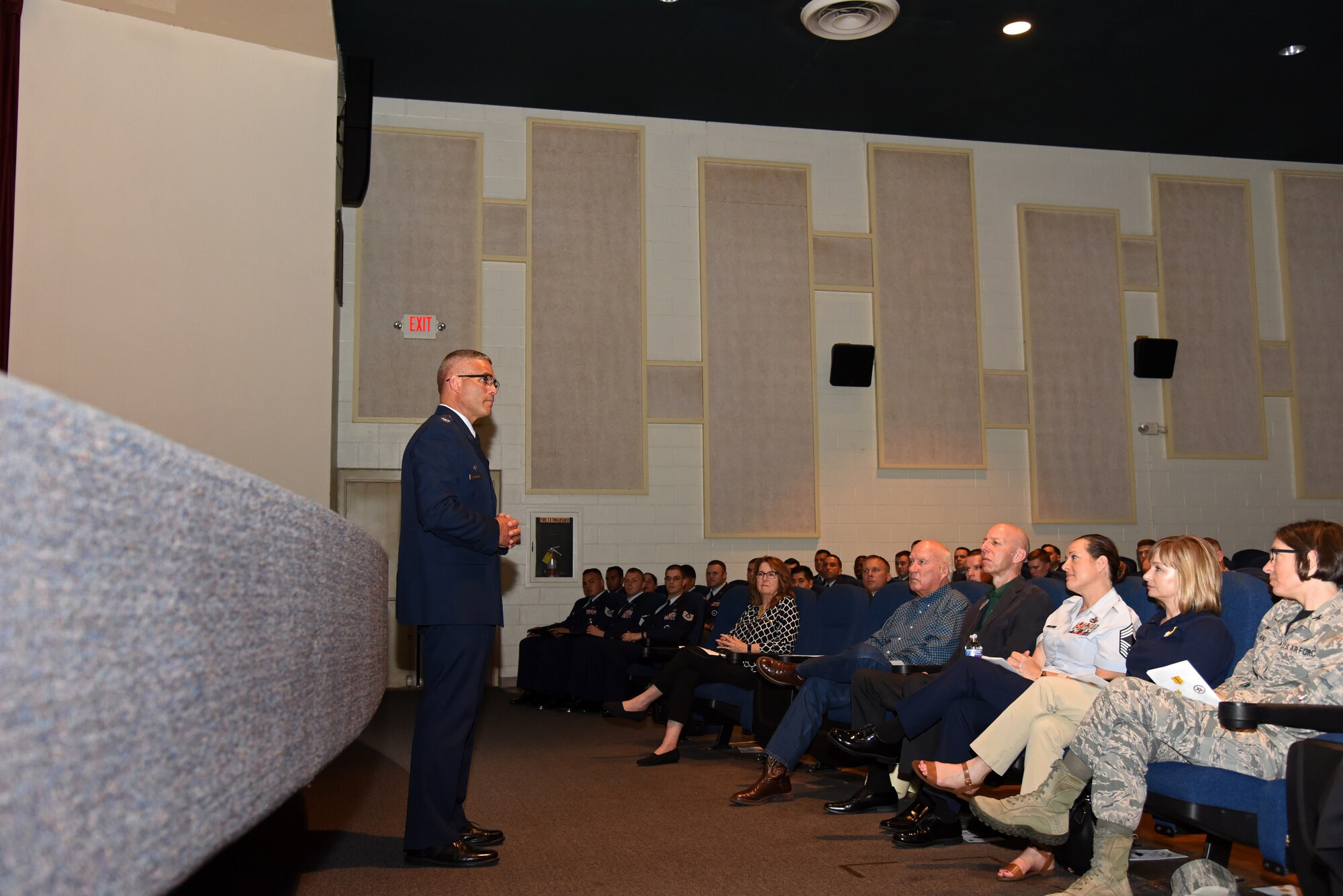 U.S. Air Force Col. Alex Ganster, 17th Training Group commander, speaks during a Community College of the Air Force graduate ceremony at the base theater on Goodfellow Air Force Base, Texas, June 15, 2018. Ganster thanked the graduates and also talked about how being an educated force makes us superior to our adversaries. (U.S. Air Force photo by Staff Sgt. Joshua Edwards/Released)