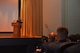 U.S. Air Force Chief Master Sgt. Jason Funkhauser, 315th Training Squadron chief enlisted manager, speaks during a Community College of the Air Force graduation ceremony at the base theater on Goodfellow Air Force Base, Texas, June 15, 2018. Funkhauser told the graduates that they should keep working on their education. (U.S. Air Force photo by Staff Sgt. Joshua Edwards/Released)