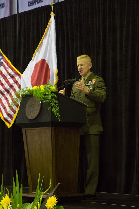 KADENA AIR BASE, OKINAWA, Japan – Brig. Gen.  Paul Rock Jr. speaks to the Kadena High School graduating class June 8 in Kadena Air Base, Okinawa, Japan.