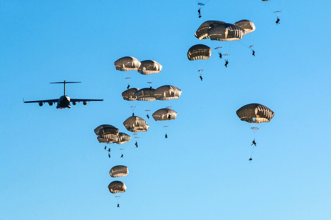 Soldiers conduct airborne operations from a C-17 Globemaster III.