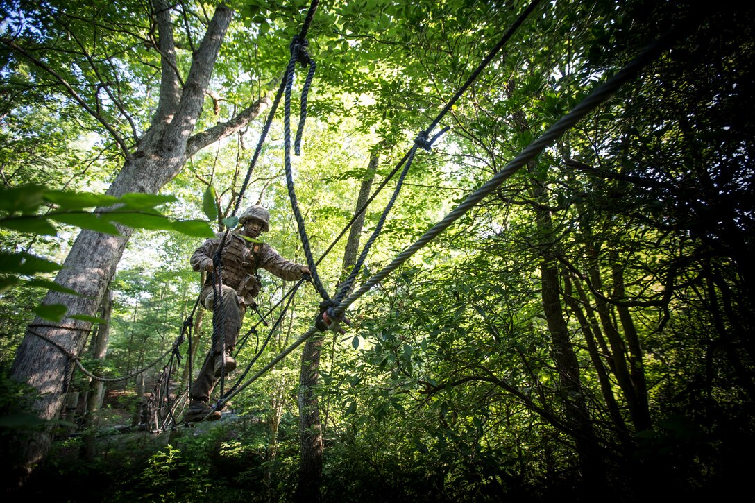 U.S. Marine Corps Officer Candidates participate in the combat course at the Officer Candidates School, Marine Corps Base Quantico, Va., June 18, 2018. Candidates must go through three months of intensive training to evaluate and screen individuals for the leadership, moral, mental, and physical qualities required for commissioning as a U.S. Marine Corps officer.