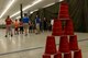 Cups sit ready while children at the Youth Center are briefed on the rules of archery at Ellsworth Air Force Base, S.D., June 13, 2018. The Youth Center is comprised of programs that teach students the basics of arts, sports and science. (U.S. Air Force photo by Airman 1st Class Nicolas Z. Erwin)