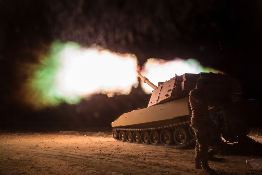 Iraqi Security Forces fire at known ISIS locations near the Iraqi-Syrian border using an M109A6 Paladin Self-Propelled Howitzer, June 8, 2018. Iraqi Security Forces and Coalition partners provided fire support as they continued Operation Roundup, the military offensive to rid the final pockets of the terrorist organization from the Middle Euphrates River Valley in Syria. (U.S. Army photo by Spc. Anthony Zendejas IV)