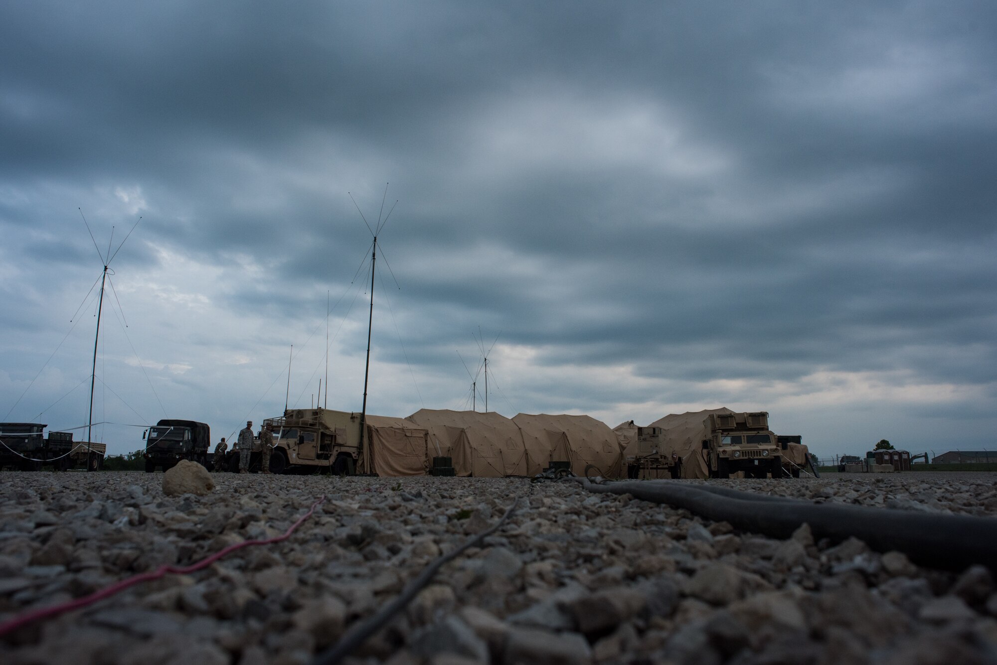 Soldiers with the Minnesota Army National Guard 1st Armored Brigade Combat Team, 34th Infantry Division, use a mobile tactical operations center to conduct combat simulations as a response cell during Warfighter 18-5 (WFX 18-5) June 11, 2018, at Camp Atterbury Joint Maneuver Training Center near Edinburgh, Indiana. WFX 18-5 was conducted to help components under the 34th Infantry Division become accustomed to using Army battle drills in a computer-simulated combat environment. (U.S. Air National Guard photo by Staff Sgt. Brigette Waltermire)