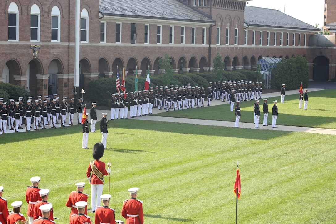 Marines with Marine Barracks Washington D.C. execute a Troop Review Ceremony at the Barracks, June 18, 2018. The Barracks hosted our Brazilian and Mexican military counterparts to honor Commandant of the Brazil Corps of Naval Infantry, Adm. Alexandre Jose Bareto de Mattos, and Coordinator General, Mexico Naval Infantry, Vice Adm. Rafael Lopez Martinez.