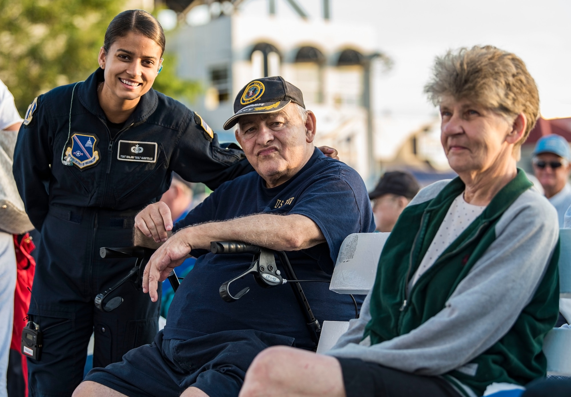 Tech. Sgt. Nalani Quintello, Max Impact vocalist, Washington, D.C., poses for a photo with U.S. Navy veteran David Bethard, a Millsboro, Del., resident, June 16, 2018, at the bandstand in Rehoboth Beach, Del. Bethard served four years as a cook onboard the USS Everglades (AD-24) before making his home in Delaware. Max Impact, the premier rock band of the U.S. Air Force, is stationed at Joint Base Anacostia-Bolling in Washington, D.C. (U.S. Air Force photo by Roland Balik)