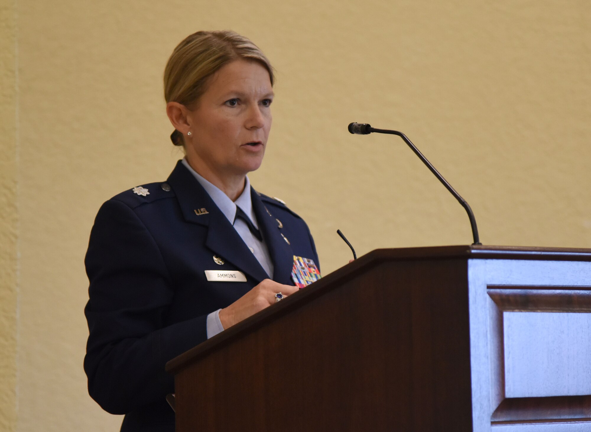 U.S. Air Force Lt. Col. Teresa Ammons, outgoing 81st Force Support Squadron commander, delivers remarks during the 81st FSS change of command ceremony in the Bay Breeze Event Center at Keesler Air Force Base, Mississippi, June 14, 2018. Maj. Amber Ortiz assumed command of the 81st FSS. (U.S. Air Force photo by Kemberly Groue)