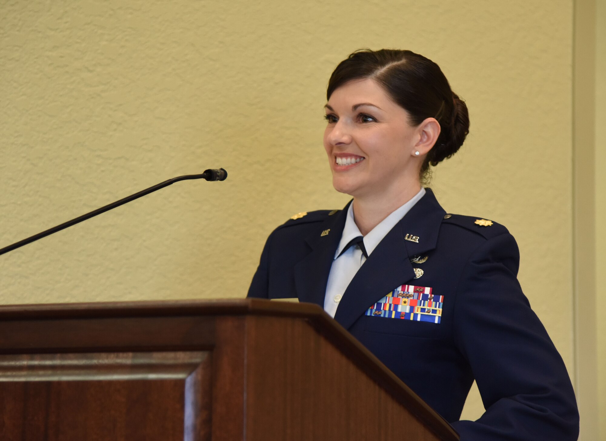 U.S. Air Force Maj. Amber Ortiz, incoming 81st Force Support Squadron commander, delivers remarks during the 81st FSS change of command ceremony in the Bay Breeze Event Center at Keesler Air Force Base, Mississippi, June 14, 2018. Ortiz assumed command of the 81st FSS from Lt. Col. Teresa Ammons. (U.S. Air Force photo by Kemberly Groue)