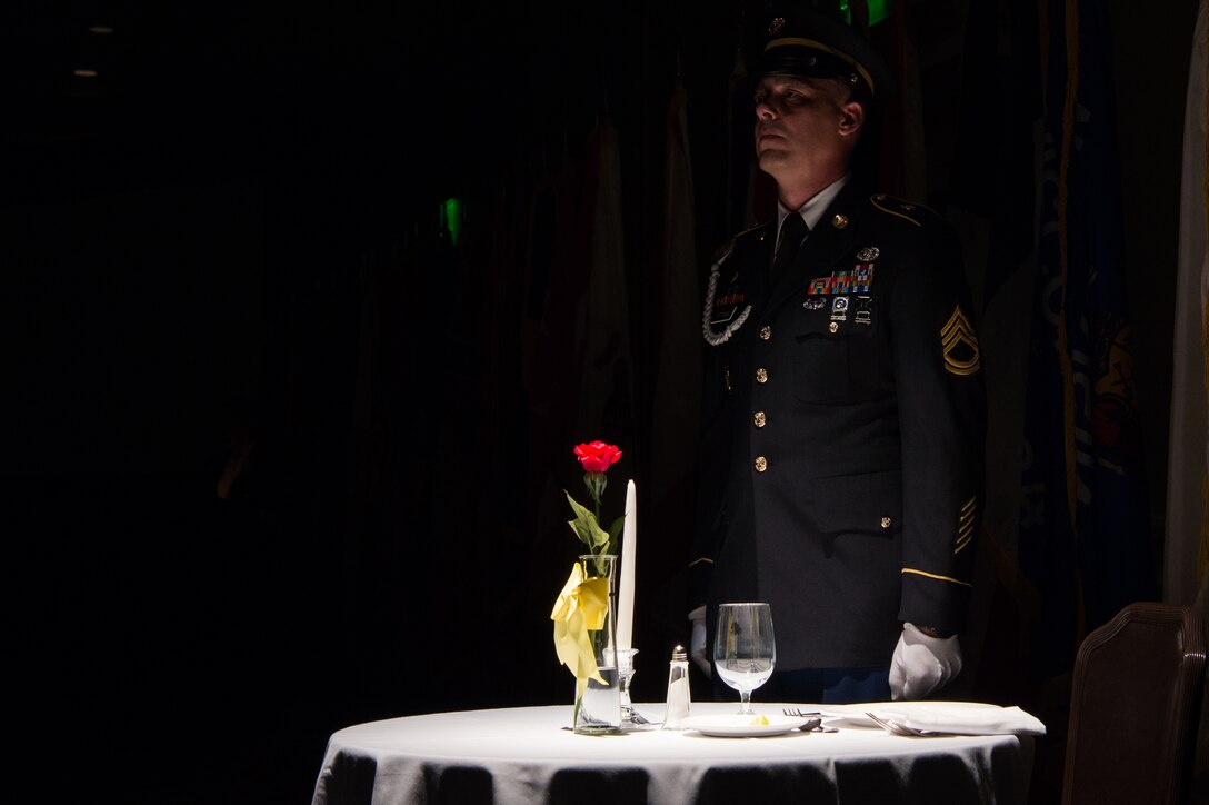 U.S. Army Sgt. 1st Class Raymond Pittman, McDonald Army Health Center radiology NCO in charge, performs a tribute to missing and fallen comrades during the Army Birthday Ball at the Colonial Williamsburg Lodge, in Williamsburg, Virginia, June 16, 2018.