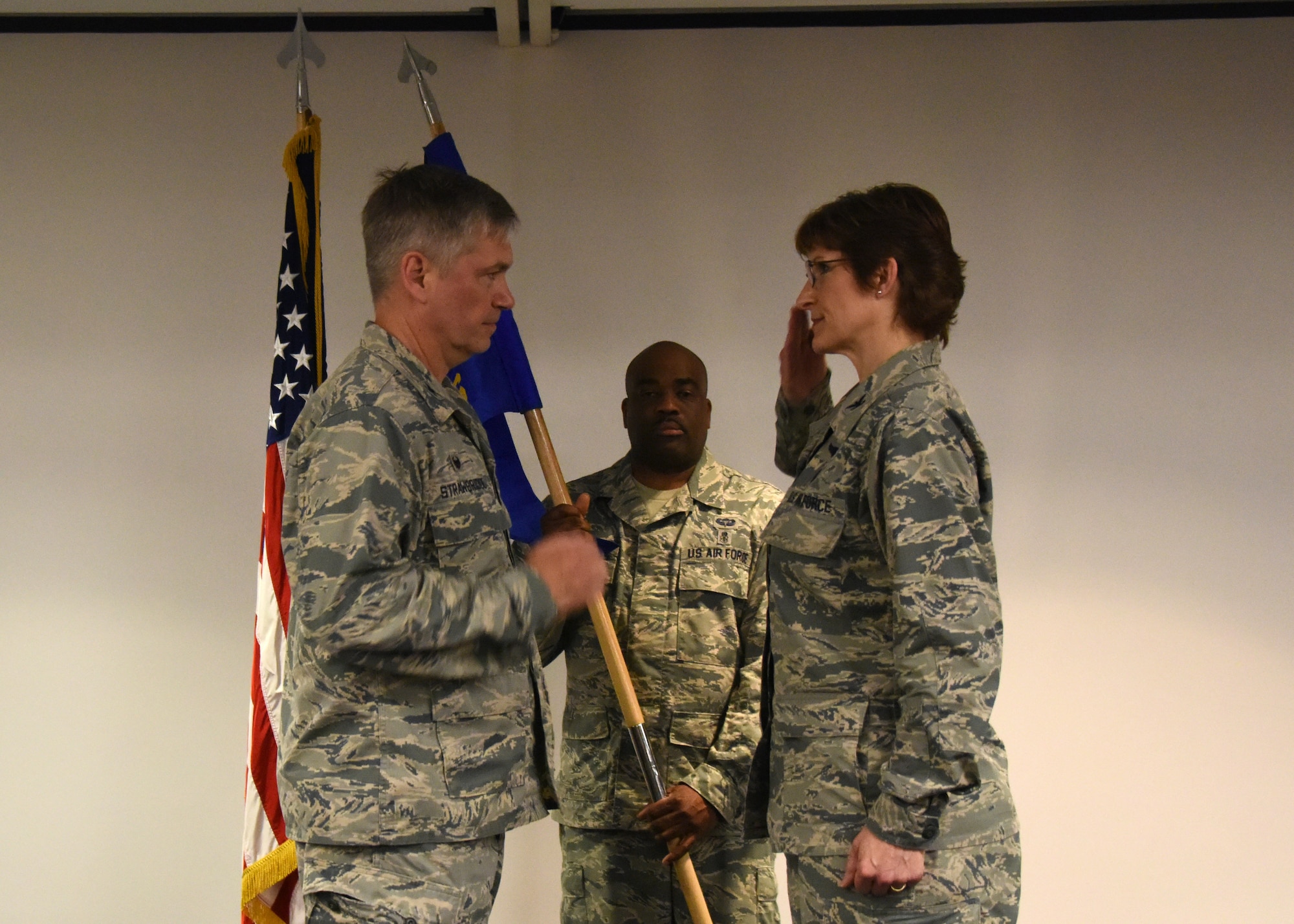 Col. Douglas Strawbridge, commander of the 911th Airlift Wing  and Col. Karen Steiner, commander of the 911th Aeromedical Staging Squadron , salute each other during an assumption of command ceremony at the Pittsburgh International Airport Air Reserve Station, Pennsylvania, June 2, 2018. Steiner assumed command of the Aeromedical Staging Squadron during the ceremony. (U.S. Air Force Photo by Senior Airman Grace Thomson)