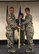 Col. Douglas Strawbridge, commander of the 911th Airlift Wing , and Col. Karen Steiner, commander of the 911th Aeromedical Staging Squadron , pass the flag at the assumption of command ceremony at the Pittsburgh International Airport Air Reserve Station June 2, 2018. This act symbolizes that Steiner is assuming responsibility for the 911th Aeromedical Staging Squadron. (U.S. Air Force Photo by Senior Airman Grace Thomson)