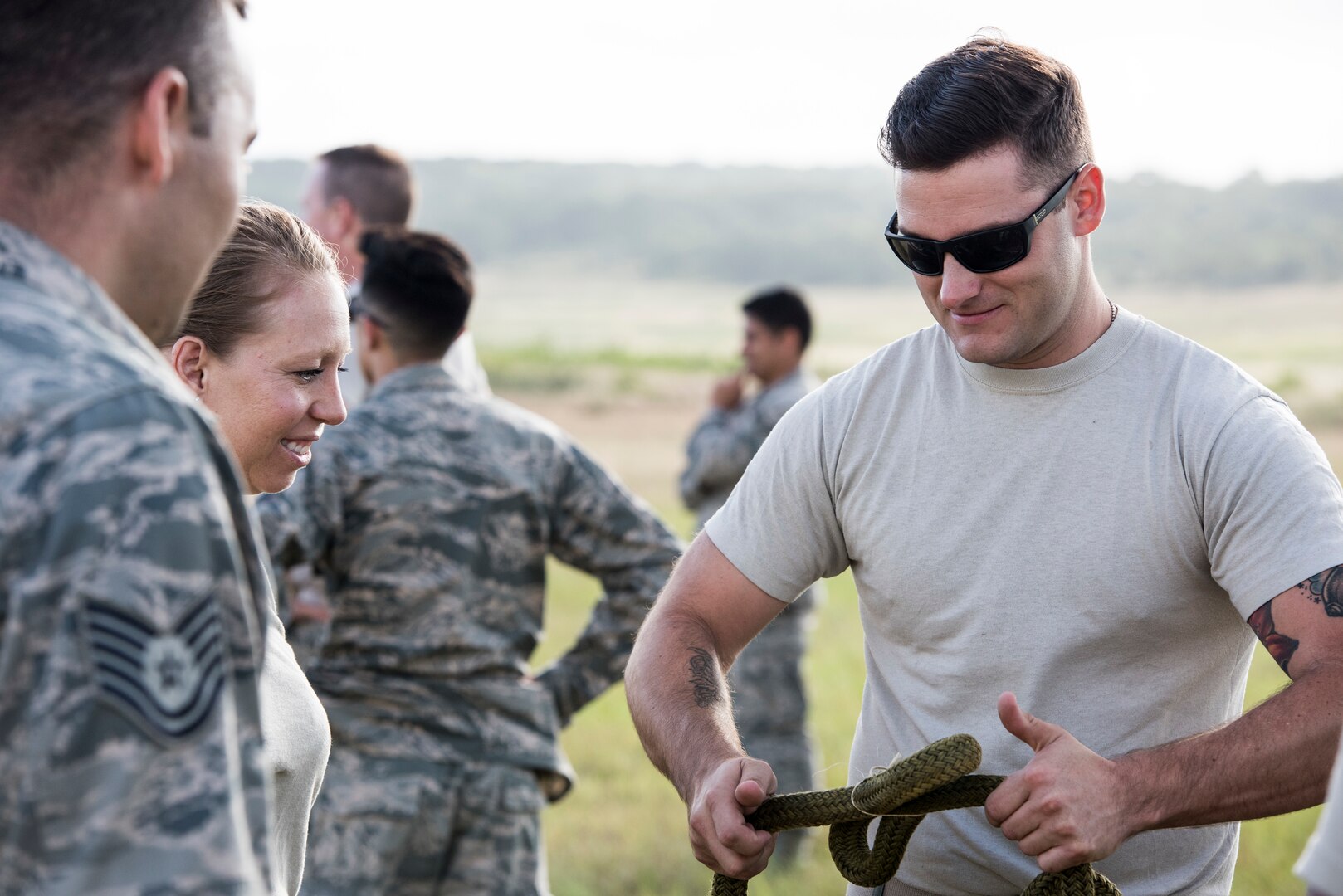 SSgt Nicholas Wilkinson, 26th Aerial Port Squadron aerial transportation technician, practices applying breakaway ties to a sling leg in preparation for a sling load mission as part of OPERATION Lone Star vigilance June 10, 2018, at Joint Base San Antonio-Camp Bullis, Texas. Operation Lone Star Vigilance was a joint-training exercise involving Active-Duty and Reserve Airmen and Soldiers from the Texas Army National Guard from installations across San Antonio. The multi-service missions saw the successful completion of aerial reconnaissance, sling loading of cargo, MEDEVAC hoists, personnel recovery and the simultaneous operation of multiple helicopter landing zones. (U.S. Air Force photo by Senior Airman Stormy Archer)