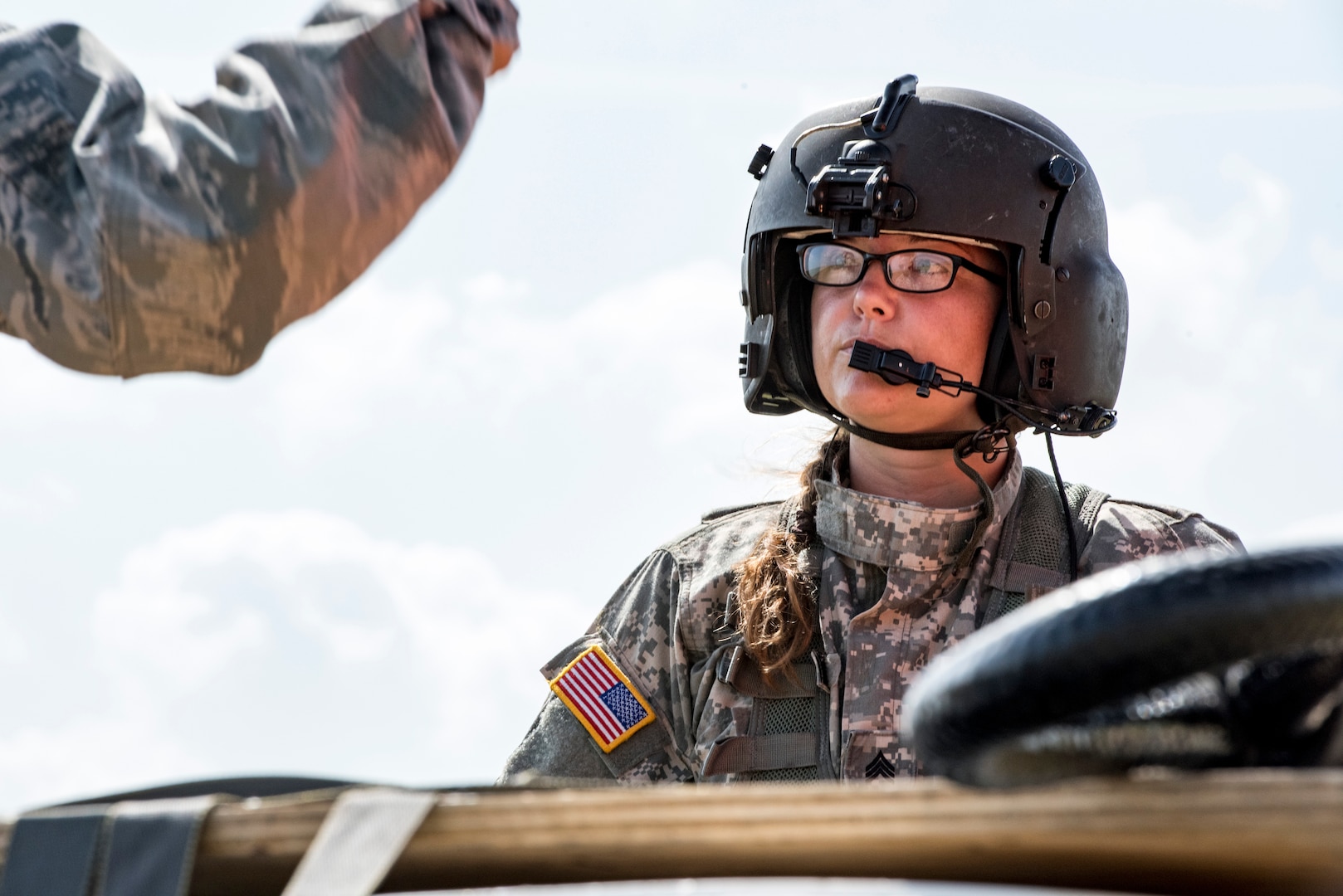 Army Sgt. Shannon Baumann, Texas Army National Guard Company C, 2-149 Aviation crew chief, inspects the rigging of an A-22 cargo bag with 2,000 pounds of “relief supplies” in preparation for a sling load mission as part of OPERATION Lone Star Vigilance June 10, 2018, at Joint Base San Antonio-Camp Bullis, Texas. Operation Lone Star Vigilance was a joint-training exercise involving Active-Duty and Reserve Airmen and Soldiers from the Texas Army National Guard from installations across San Antonio. The multi-service missions saw the successful completion of aerial reconnaissance, sling loading of cargo, MEDEVAC hoists, personnel recovery and the simultaneous operation of multiple helicopter landing zones. (U.S. Air Force photo by Senior Airman Stormy Archer)