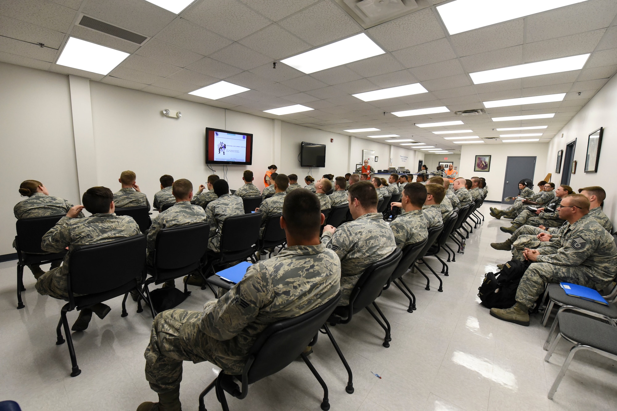 Airmen gather for final readiness exercise briefings June 14, 2018, on Grand Forks Air Force Base, North Dakota. Airmen were instructed on the resources available during a deployment and given a better understanding of how the deployment process works.(U.S. Air Force photo by Airman 1st Class Melody K. Wolff)