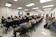 Airmen gather for final readiness exercise briefings June 14, 2018, on Grand Forks Air Force Base, North Dakota. Airmen were instructed on the resources available during a deployment and given a better understanding of how the deployment process works.(U.S. Air Force photo by Airman 1st Class Melody K. Wolff)