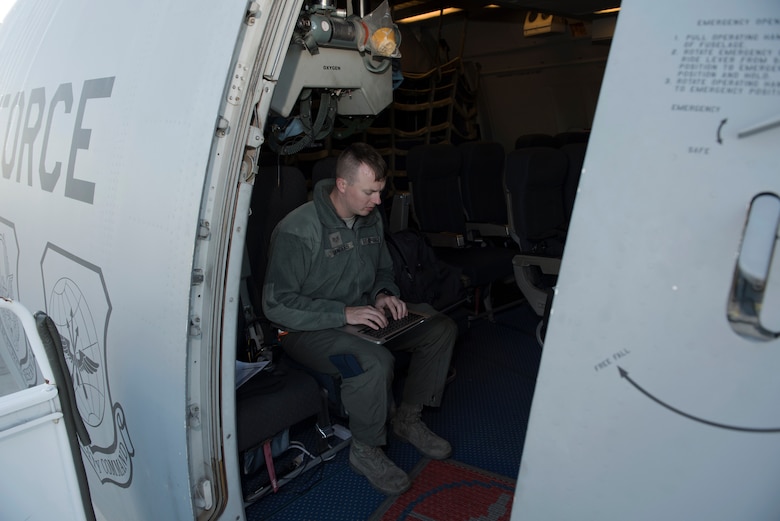 Staff Sgt. Scott Sanders, 660th Aircraft Maintenance Squadron KC-10 Extender flying crew chief, logs maintenance actions during pre-flight prep for a KC-10 before leaving Eielson Air Force Base, Alaska, June 2, 2018. Sanders served as one of two crew chiefs on the KC-10 for a five-day refueling mission in the Pacific theater. Flying crew chiefs are responsible for maintaining aircraft during missions away from that aircraft’s home station. (U.S. Air Force photo by Tech. Sgt. James Hodgman)