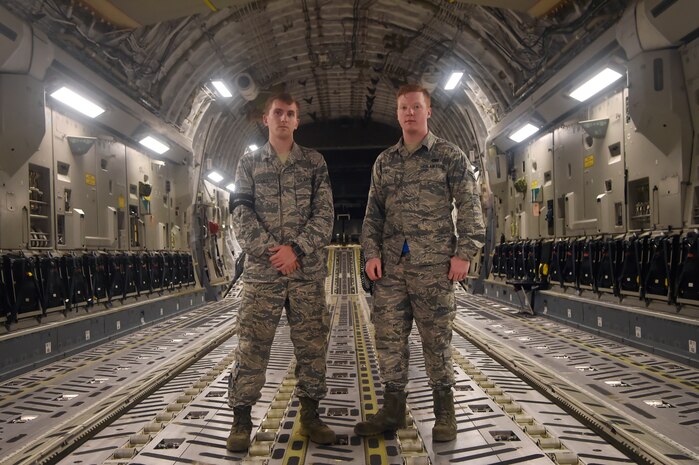 Staff Sgt. James Crance, left, and Airman 1st Class Andrew Causey, right, both 437th Aircraft Maintenance Squadron crew chiefs, pose in the cargo compartment of a C-17 Globemaster III prior to launch June 14, 2018, at Joint Base Charleston, S.C. Crew chiefs here are responsible for coordinating the care and maintenance of one of the largest fleets of C-17 aircraft in the Air Force in support of Air Mobility Command’s rapid global mobility mission.