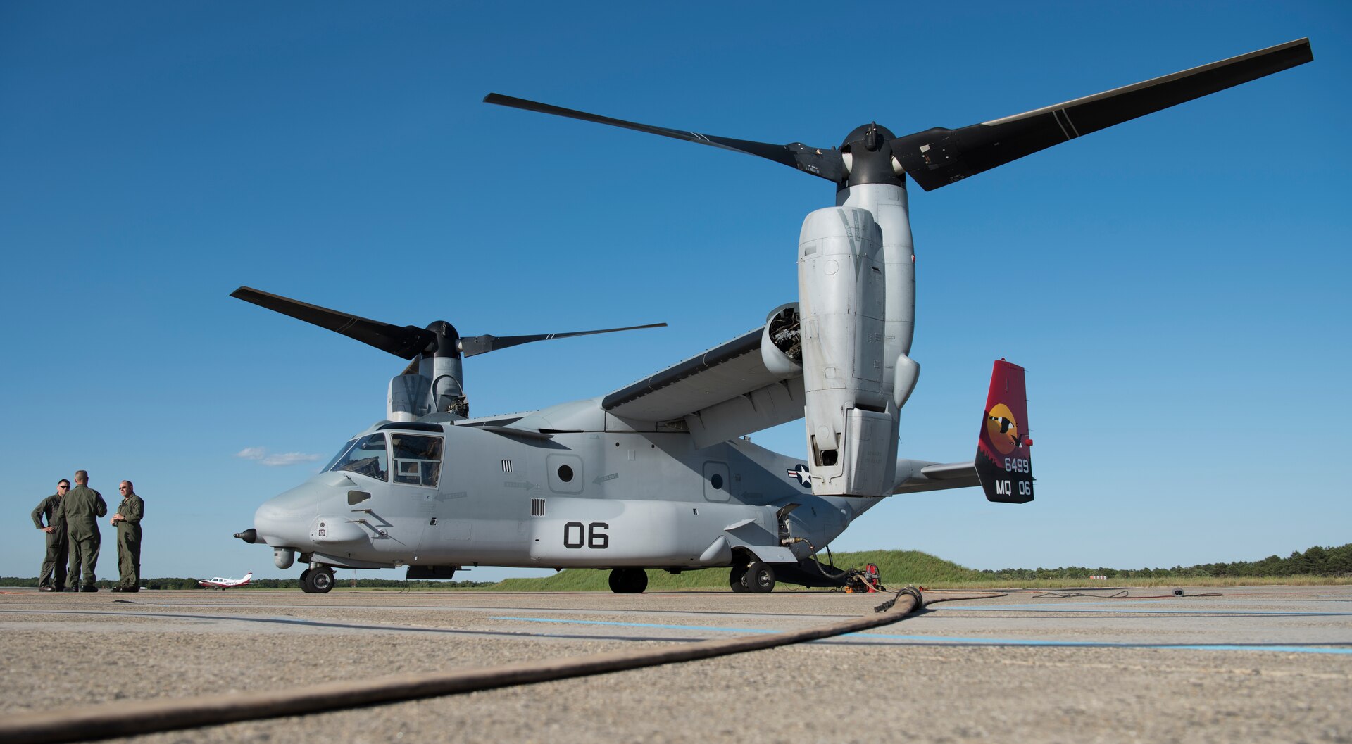 A Marine Medium Tilt Roader Squadron (VMM) 774 V-22 Osprey taxis on Coast Guard Air Station Atlantic City flightline during a forward air-refueling point on Coast Guard Air Station Atlantic City, N.J., June 14, 2018. The refueling took place during the 2018 Marine Aircraft Group 49 Combined Arms Exercise - a two-week joint training operation. (U.S. Air Force photo by Airman Ariel Owings)