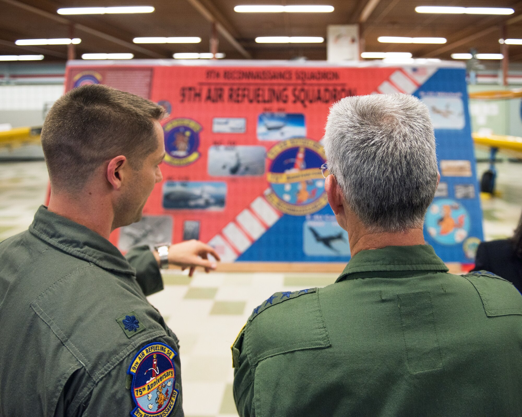 U.S. Air Force Lt. Col. Stew Welch, left, 9th Air Refueling Squadron commander, shows off the 9th ARS heritage wall during its unveiling to Gen. Paul Selva, Vice Chairman of the Joint Chiefs of Staff, and unveil the 9th ARS heritage wall at the Heritage Museum at Travis Air Force Base, Calif., June 15, 2018. Selva was the commander of the 9th ARS from 1994-95, and he was at Travis both to celebrate the 9th ARS’s 75th Anniversary and to be the keynote speaker at the base’s 75th Anniversary Dining Out. (U.S. Air Force photo by Louis Briscese)
