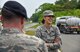 Cadet 2nd Class Jessica Fernandez, a United States Air Force Academy cadet, laughs while having a conversation with Capt. Austin Phillips, the 35th Security Forces Squadron operations officer, during a gate tour at Misawa Air Base, Japan, June 18, 2018. The cadets toured organizations within the 35th Fighter Wing during Operation Air Force, a two-week program that allows cadets to see active duty Air Force life and the different career fields open to them upon graduation. (U.S. Air Force photo by Airman 1st Class Collette Brooks)