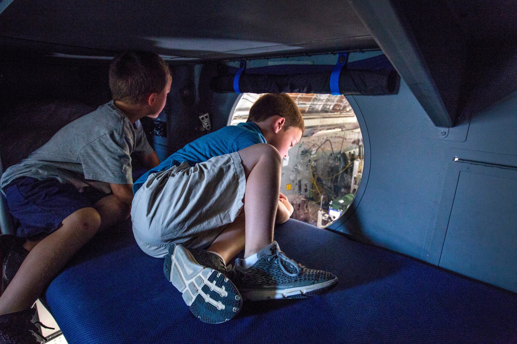 Two visitors check out the view of the C-17 Globemaster III’s cargo bay during the Innovations in Flight Family Day and Outdoor Aviation Display at the Steven F. Udvar-Hazy Center, Chantilly, Virginia, June 16, 2018. A KC-10 Extender and a C-17 crewed by Reserve Citizen Airmen with the 78th Air Refueling Squadron and the 732nd Airlift Squadron, both with the 514th Air Mobility Wing, participated in the event at the Center. The 514th is an Air Force Reserve Command unit located at Joint Base McGuire-Dix-Lakehurst, N.J. (U.S. Air Force photo by Master Sgt. Mark C. Olsen)