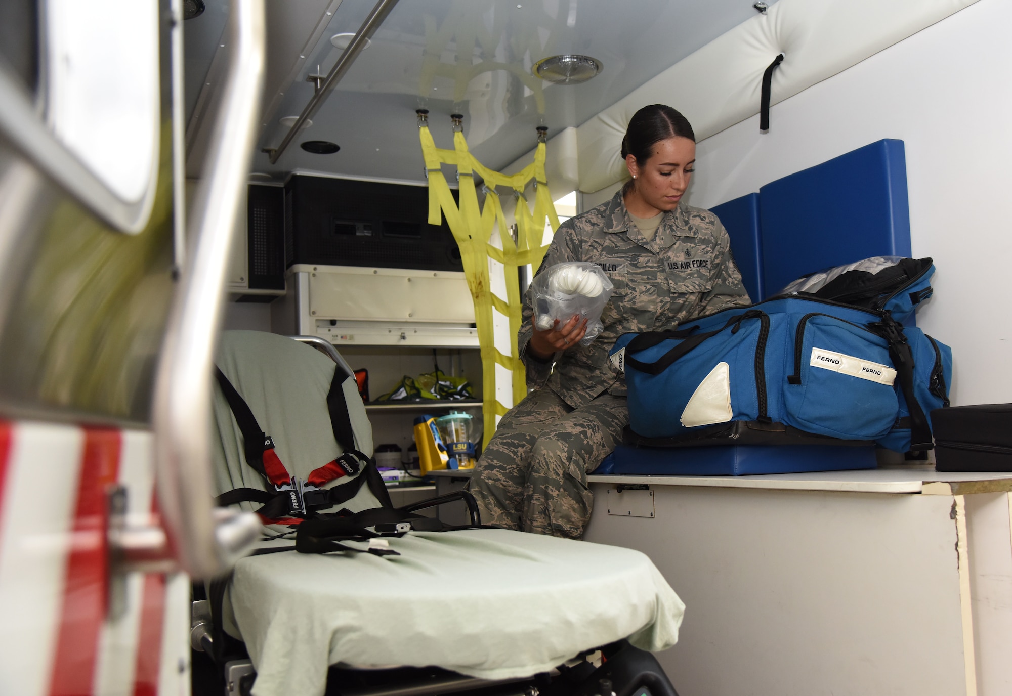 U.S. Air Force Tech. Sgt. Juliet Corcillo, 81st Medical Operations Squadron Emergency Department NCO in charge, conducts a daily function check inside an ambulance at Keesler Air Force Base, Mississippi, June 14, 2018. Corcillo will begin her first day of medical school July 6 with a four-year scholarship from the Air Force’s Health Professions Scholarship Program. (U.S. Air Force photo by Kemberly Groue)