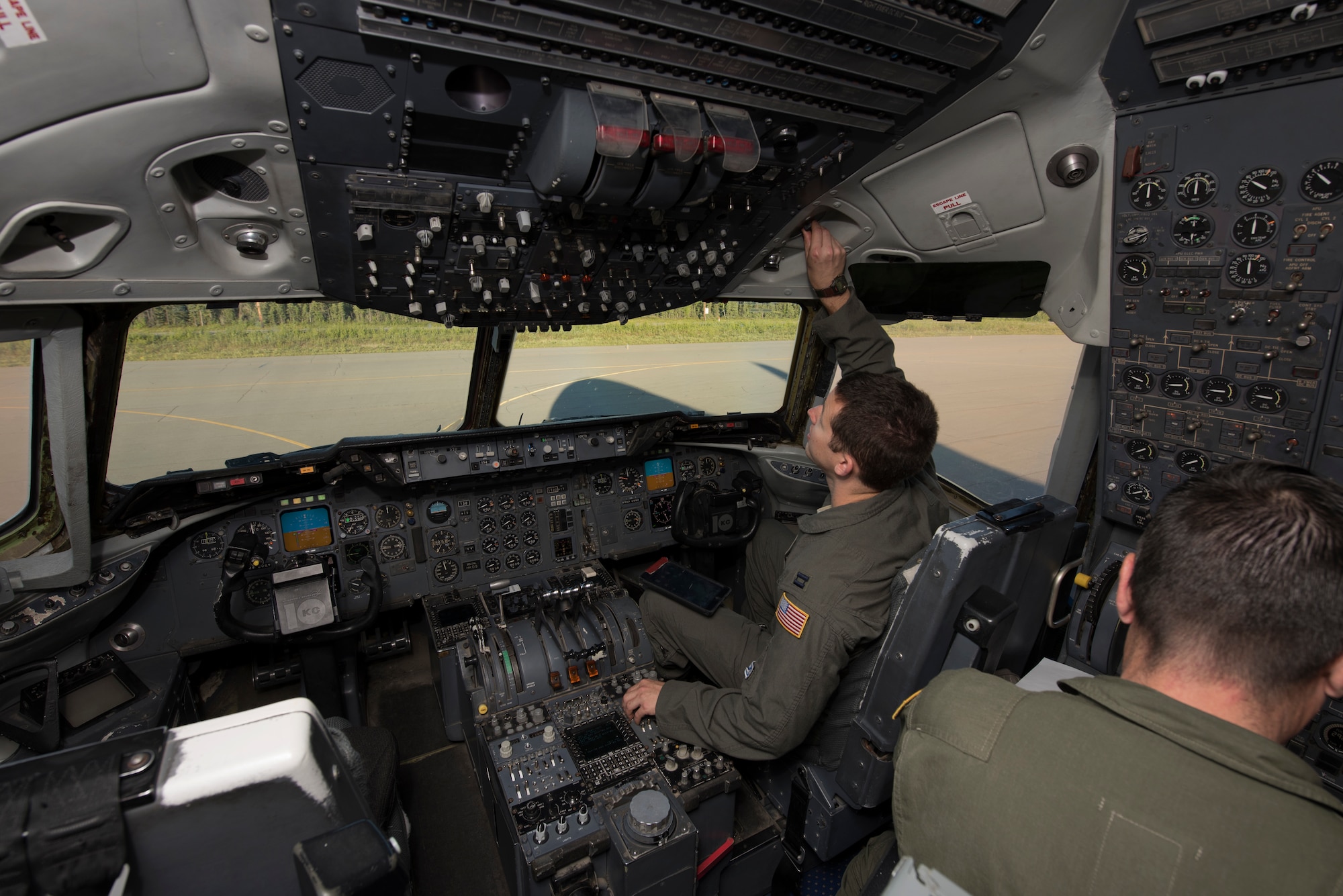 U.S. Air Force Capt. Eddie Miller, 6th Air Refueling Squadron assistant flight commander for the mission support flight and a KC-10 aircraft commander, conducts a flight controls check in the cockpit of a KC-10 at Eielson Air Force Base, Alaska, June 6, 2018. The aircraft completed a five-day mission which featured refueling U.S. Air Force F-15C Eagles and Japan Air Self-Defense Force fighter aircraft in the Indo-Pacific Command area of operations. (U.S. Air Force photo by Tech. Sgt. James Hodgman)