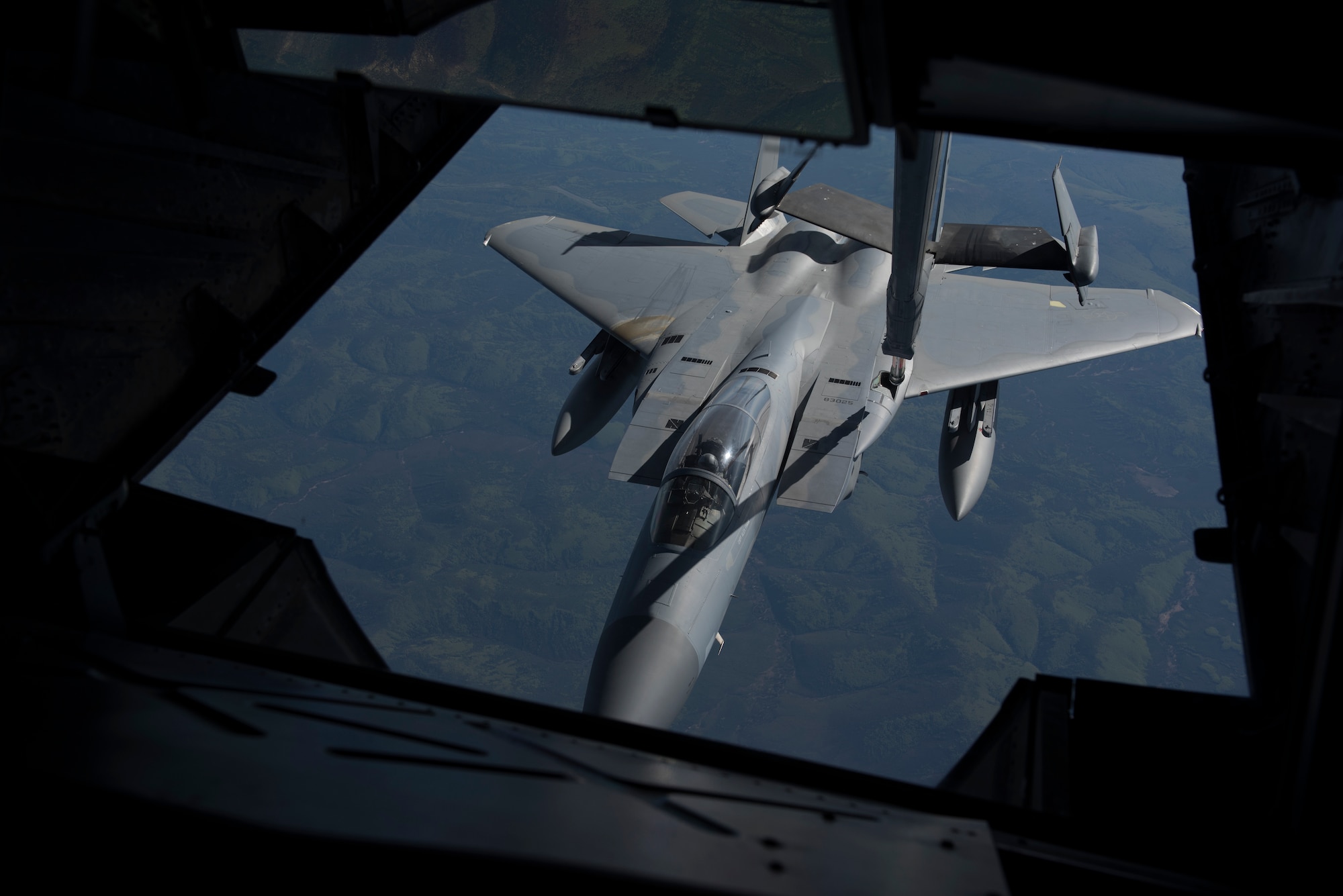A U.S. Air Force F-15C Eagle assigned to the 18th Wing at Kadena Air Base, Japan, is refueled by a KC-10 Extender from the 6th Air Refueling Squadron, Travis Air Force Base, Calif., June 2, 2018. The KC-10 refueled two F-15C Eagles a total of 16 times, offloading a total of 78,400 pounds of fuel over a distance covering nearly 2,300 nautical miles on a mission in the Indo-Pacific region. (U.S. Air Force photo by Tech. Sgt. James Hodgman)