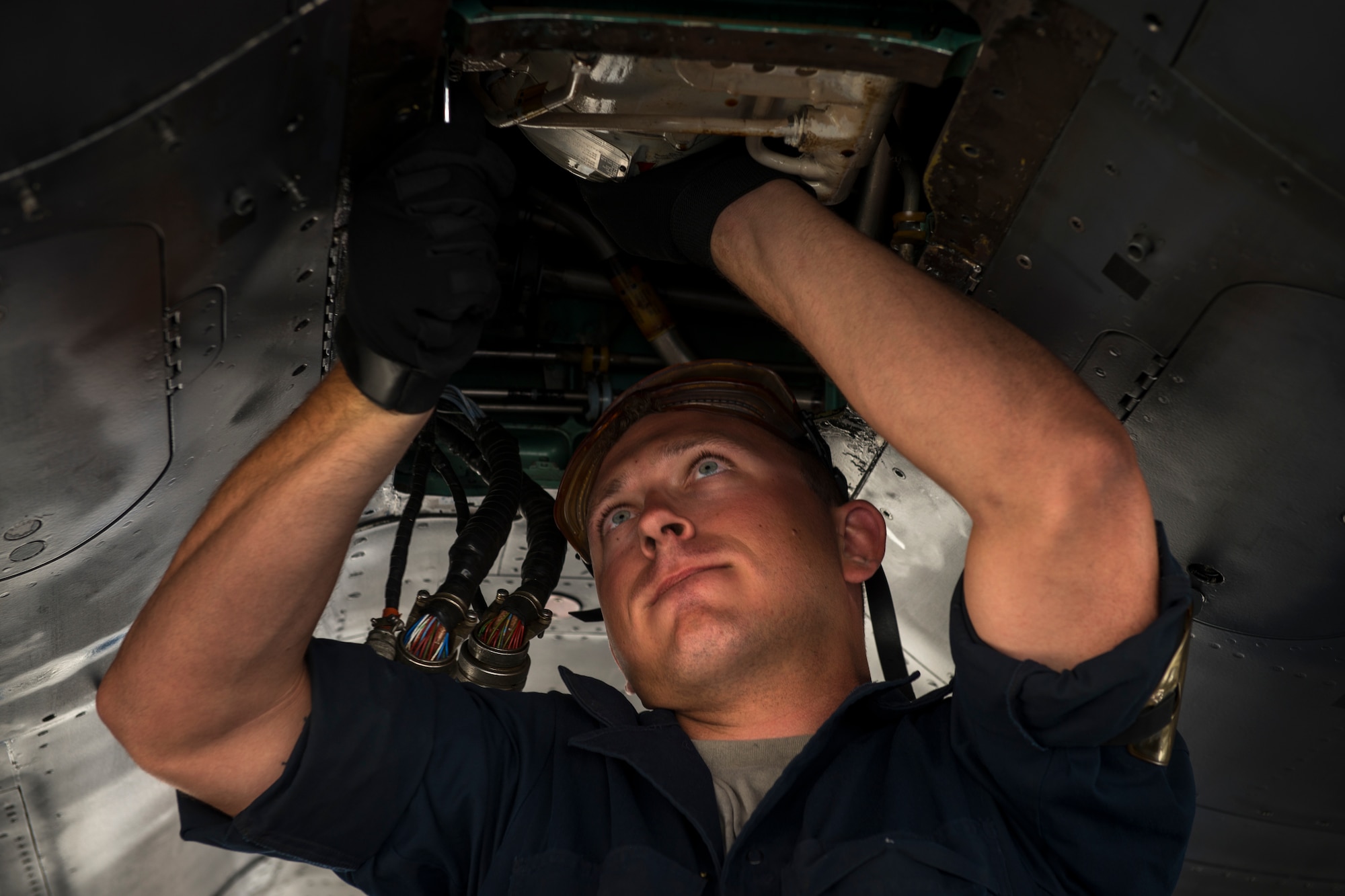 Senior Airman Caleb Collins, 391st Fighter Squadron crew chief, maintains an F-15 Eagle central gearbox jet fuel starter during Green Flag West, June 11, 2018, at Nellis Air Force Base, Nevada. The 391st FS participated in Green Flag to further enhance readiness by training on Close Air Support over the National Training Center, Fort Irwin, California. (U.S. Air Force photo by Airman 1st Class JaNae Capuno)