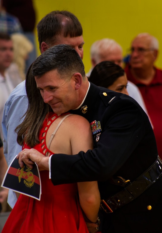Col. Jeffrey C. Smitherman, 6th Marine Corps District Commanding Officer, consoles Hunter A. Northcutt’s sister, Tori Northcutt, during the Honorary Marine Ceremony (posthumously) for Hunter at Pelham Elementary School, Pelham, Tennessee, June 13, 2018. During Hunter’s cancer treatments, he shifted his attention from himself and displayed the fighting spirit of a Marine by helping and inspiring other patients to fight and never give up.  (U.S. Marine Corps photo by Sgt. Mandaline Castillo)