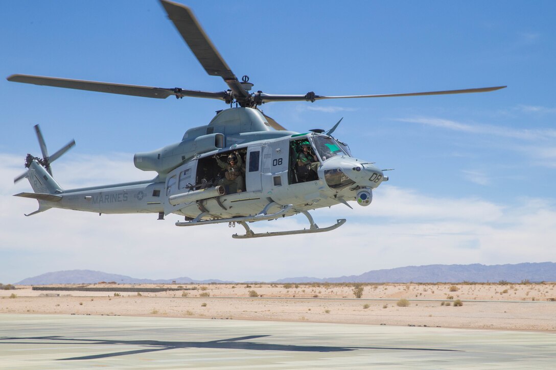 A UH-1Y Venom with Marine Light Helicopter Attack Squadron 775, Marine Aircraft Group 41, 4th Marine Aircraft Wing, taxis onto the airfield after a gun shoot, during Integrated Training Exercise 4-18 at Marine Corps Air Ground Combat Center Twentynine Palms, Calif., June 16, 2018. MAG 41, comprised of fixed wing tactical aircraft, tilt-rotor aircraft and rotary-wing assault support aircraft, provide the Aviation Combat Element to Marine Air-Ground Task Force 23 during ITX 4-18. (U.S. Marine Corps photo by Lance Cpl. Samantha Schwoch/released)