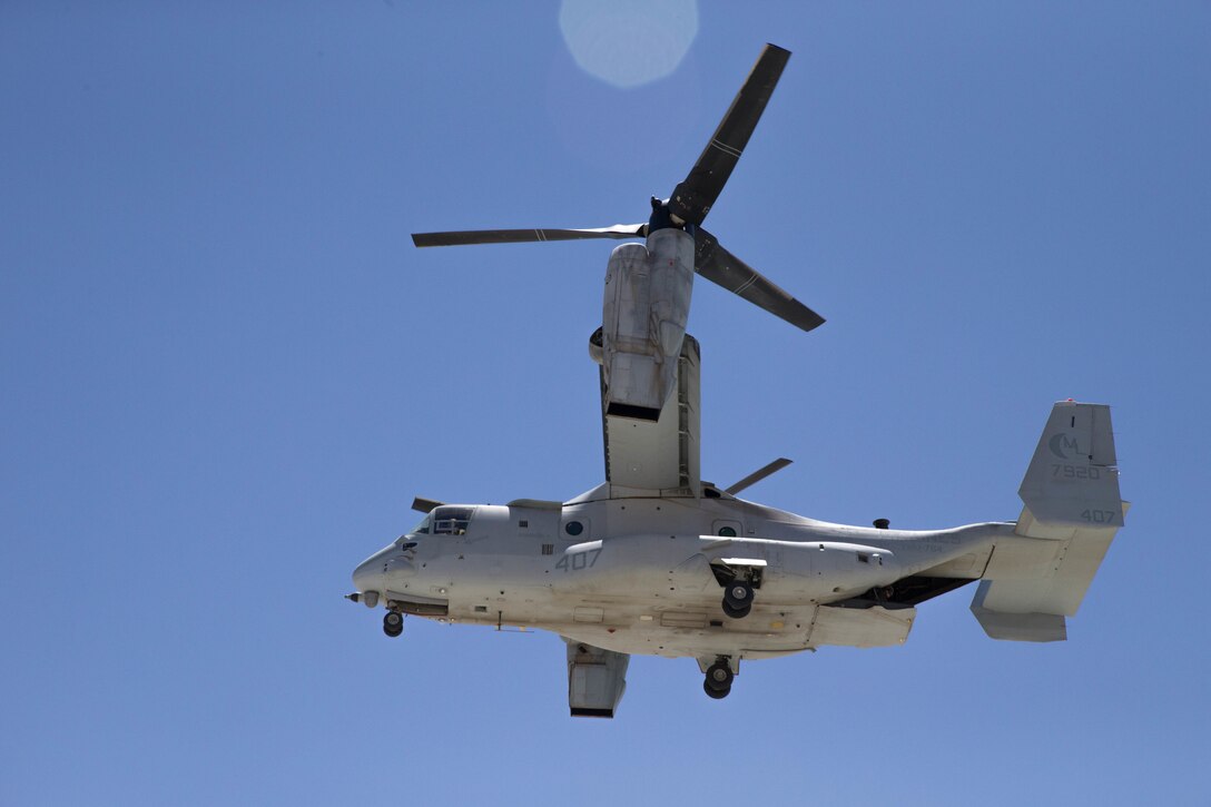 An MV-22 Osprey with Marine Medium Tiltrotor Squadron 764, Marine Aircraft Group 41, 4th Marine Aircraft Wing, flys over the runway after take-off, carrying Marines with Integrated Training Exercise 4-18 for a motivation flight, at Marine Corps Air Ground Combat Center Twentynine Palms, Calif., June 16, 2018. MAG 41, comprised of fixed wing tactical aircraft, tilt-rotor aircraft and rotary-wing assault support aircraft, provide the Aviation Combat Element to Marine Air-Ground Task Force 23 during ITX 4-18. (U.S. Marine Corps photo by Lance Cpl. Samantha Schwoch/released)