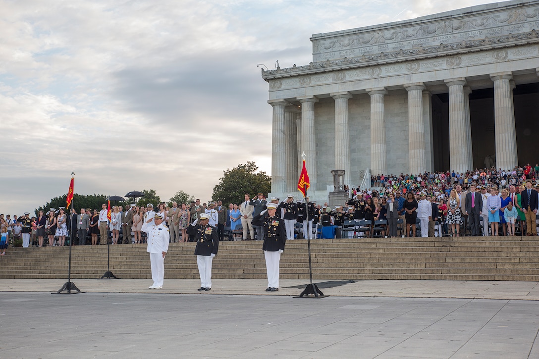 From left, Vice Adm. Octavio Trejo Hermida, Mexico Naval Attaché, Brig. Gen. Dmitri Henry, director on Intelligence, and Col. Tyler J. Zagurski, commanding officer, Marine Barracks Washington D.C., render a salute during a Tuesday Sunset Parade at the Lincoln Memorial, Washington D.C., June 19, 2018.