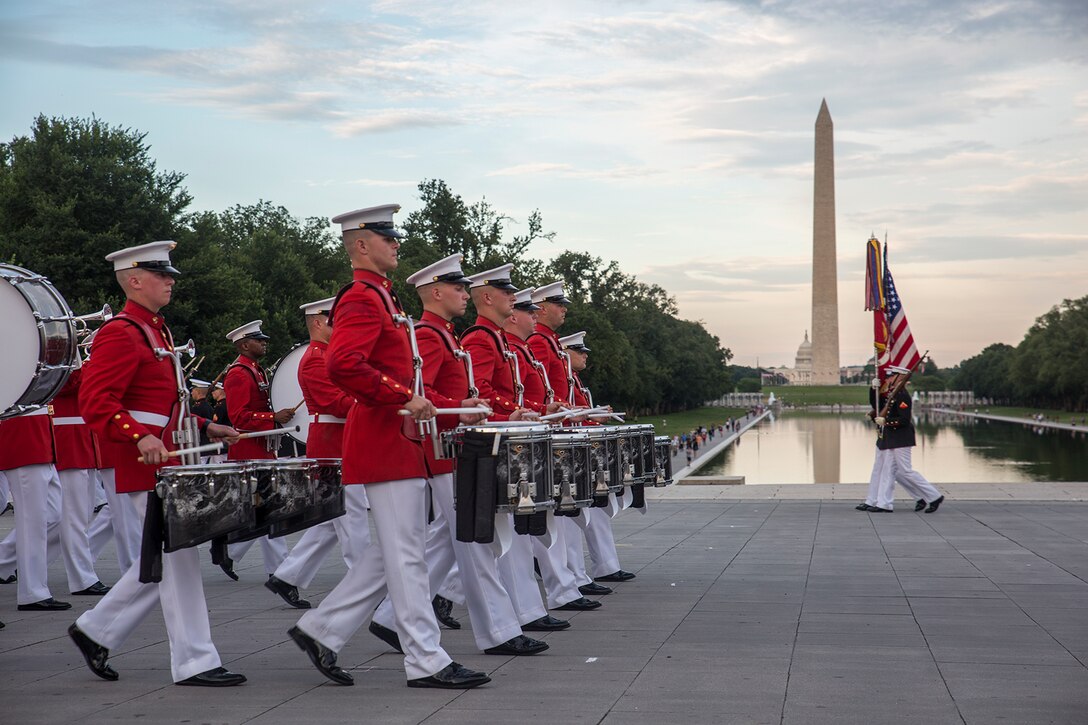 Marines with “The Commandant’s Own” U.S. Marine Drum & Bugle Corps perform a musical ballad for pass and review during a Tuesday Sunset Parade at the Lincoln Memorial, Washington D.C., June 19, 2018. The guest of honor for the parade was Vice Adm. Octavio Trejo Hermida, Mexico Naval Attaché, and the hosting official was Brig. Gen. Dmitri Henry, director of intelligence. (Official U.S. Marine Corps photo by Sgt. Robert Knapp/Released)