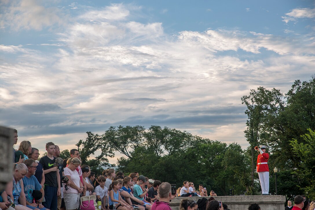 Staff Sgt. Codie Williams, ceremonial bugler, “The Commandant’s Own” U.S. Marine Drum & Bugle Corps, performs Taps during a Tuesday Sunset Parade at the Lincoln Memorial, Washington D.C., June 19, 2018. The guest of honor for the parade was Vice Adm. Octavio Trejo Hermida, Mexico Naval Attaché, and the hosting official was Brig. Gen. Dmitri Henry, director of intelligence. (Official U.S. Marine Corps photo by Sgt. Robert Knapp/Released)