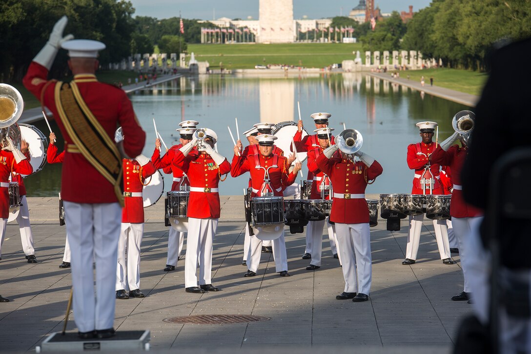 Marines with “The Commandant’s Own” U.S. Marine Drum & Bugle Corps perform a musical ballad during a Tuesday Sunset Parade at the Lincoln Memorial, Washington D.C., June 19, 2018. The guest of honor for the parade was Vice Adm. Octavio Trejo Hermida, Mexico Naval Attaché, and the hosting official was Brig. Gen. Dmitri Henry, director of intelligence. (Official U.S. Marine Corps photo by Sgt. Robert Knapp/Released)