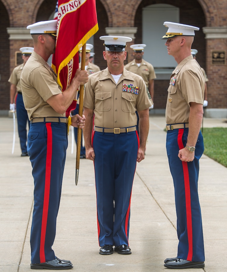 Colonel Don Tomich, left, incoming commanding officer, Marine Barracks Washington D.C., holds the Marine Corps Battle Colors during a change of command ceremony at the Barracks, June 20, 2018. Colonel Tyler J. Zagurski relinquished his command of Marine Barracks Washington D.C. to Col. Don Tomich. Tomich previously served as the Assistant Chief of Staff for Operations, Marine Forces Central Command. (Official Marine Corps photo by Sgt. Robert Knapp/Released)