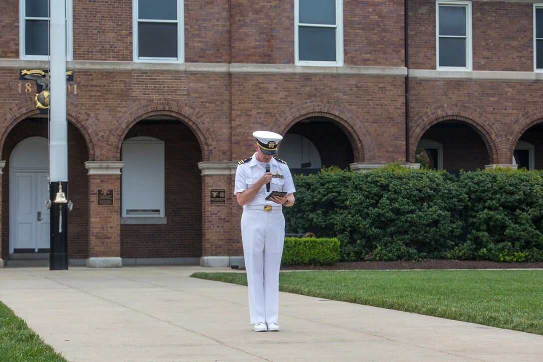 Lieutenant Cmdr. Justin Bernard, chaplain, Marine Barracks Washington D.C., delivers the invocation during a change of command ceremony at the Barracks, June 20, 2018. Colonel Tyler J. Zagurski relinquished his command of Marine Barracks Washington D.C. to Col. Don Tomich. Tomich previously served as the Assistant Chief of Staff for Operations, Marine Forces Central Command. (Official Marine Corps photo by Sgt. Robert Knapp/Released)