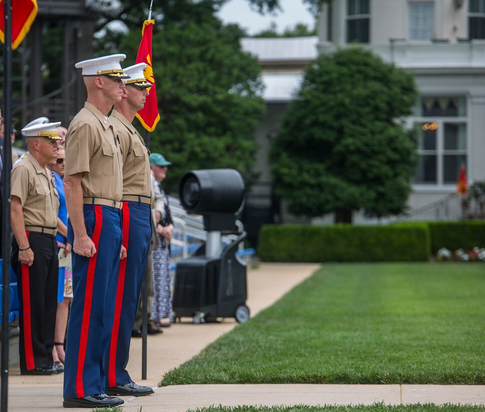 Colonel Tyler J. Zagurski, left, outgoing commanding officer, Marine Barracks Washington D.C., and Col. Don Tomich, incoming commanding officer, Marine Barracks Washington D.C., stand at attention during a change of command ceremony at the Barracks, June 20, 2018. Colonel Tyler J. Zagurski relinquished his command of Marine Barracks Washington D.C. to Col. Don Tomich. Tomich previously served as the Assistant Chief of Staff for Operations, Marine Forces Central Command. (Official Marine Corps photo by Sgt. Robert Knapp/Released)